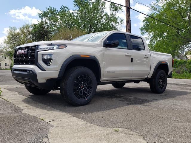 2026 GMC Canyon Elevation in Coastal Dune — front three-quarter view