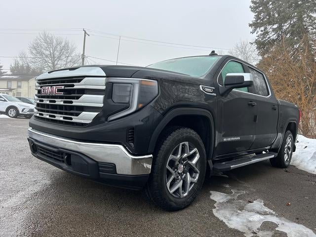 2026 GMC Sierra 1500 SLE in Onyx Black — front three-quarter view