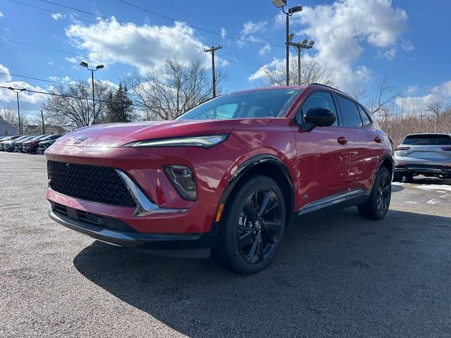 2026 Buick Envision Sport Touring in Brilliant Red — front three-quarter view